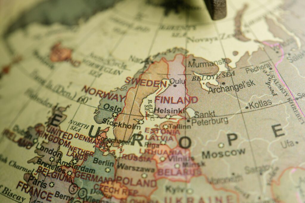 Detailed close-up image of a globe focusing on Northern Europe, featuring country labels and borders.